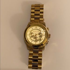 Michael Kors Large Runway Gold Watch.
